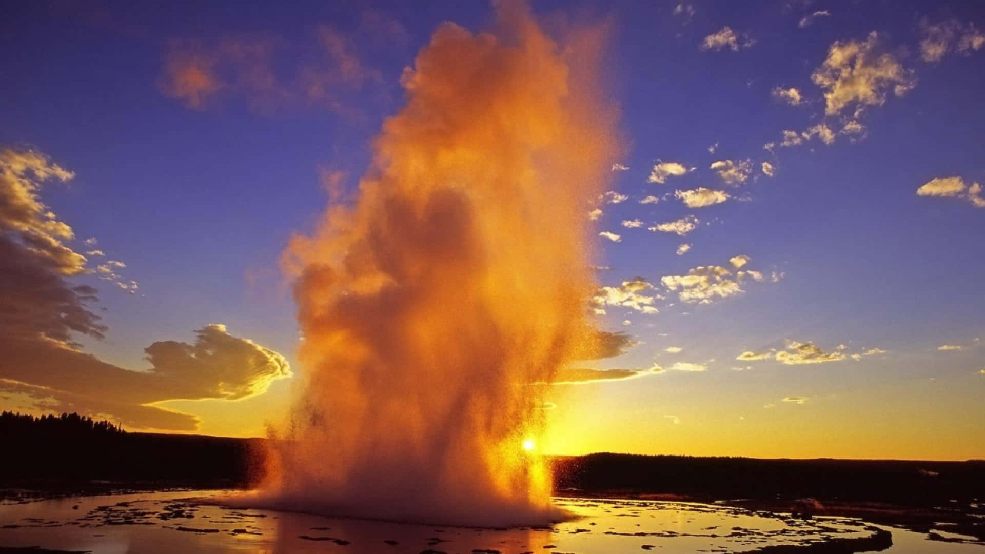 Majestic eruption of a Yellowstone geyser Wallpaper