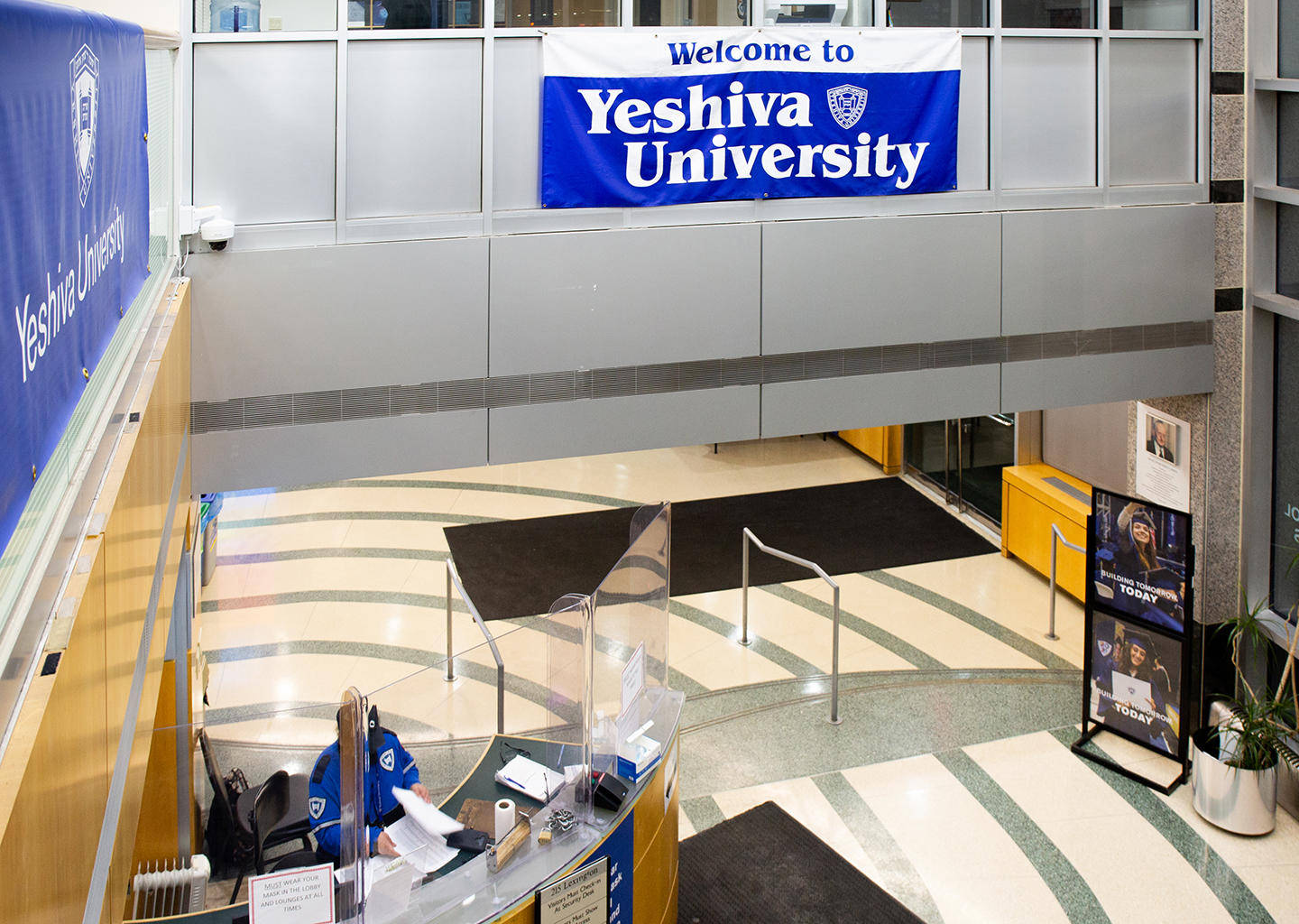 Yeshiva University Banner On Walkway Wallpaper