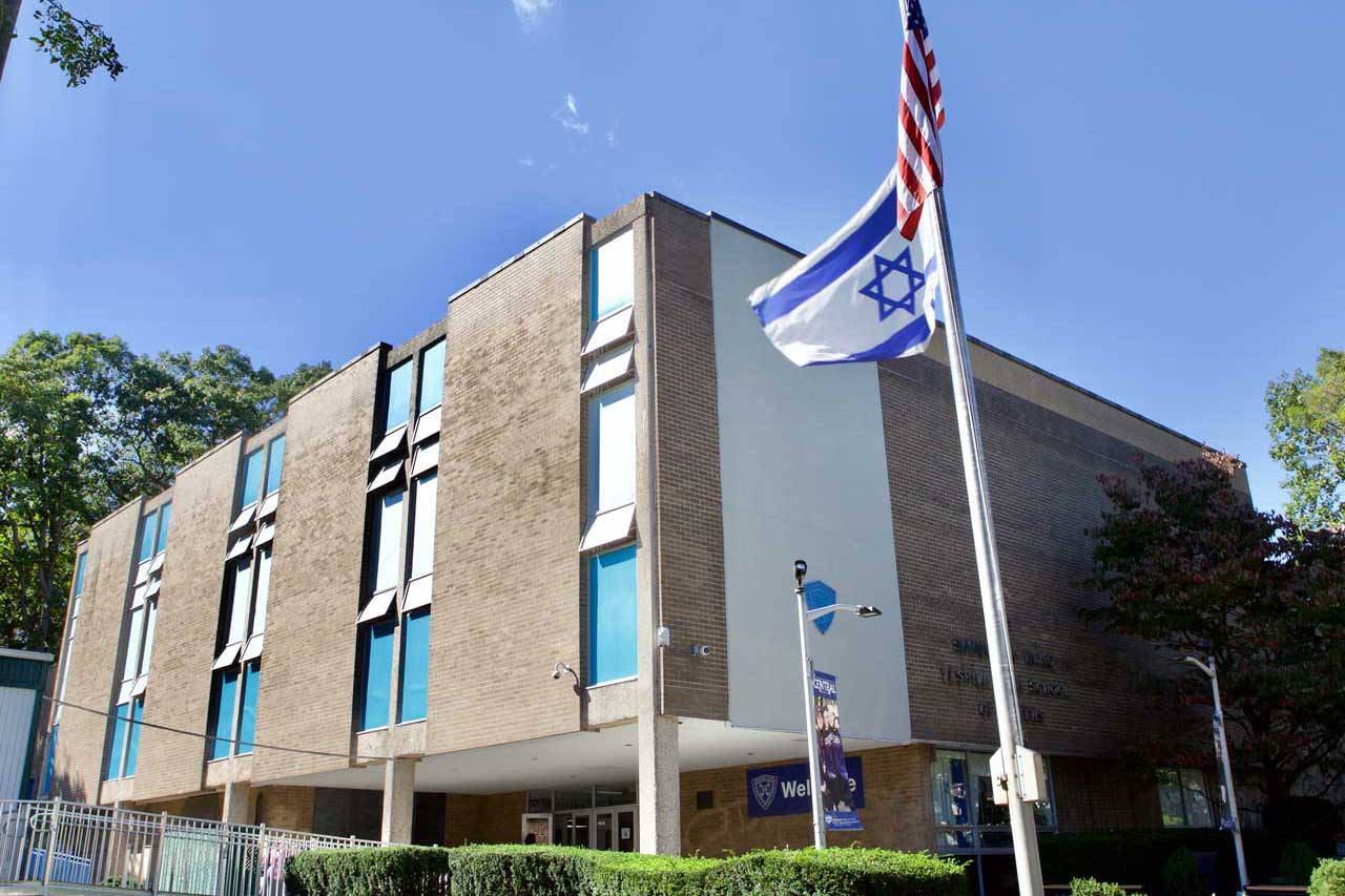 Yeshiva University Building With Flags Wallpaper