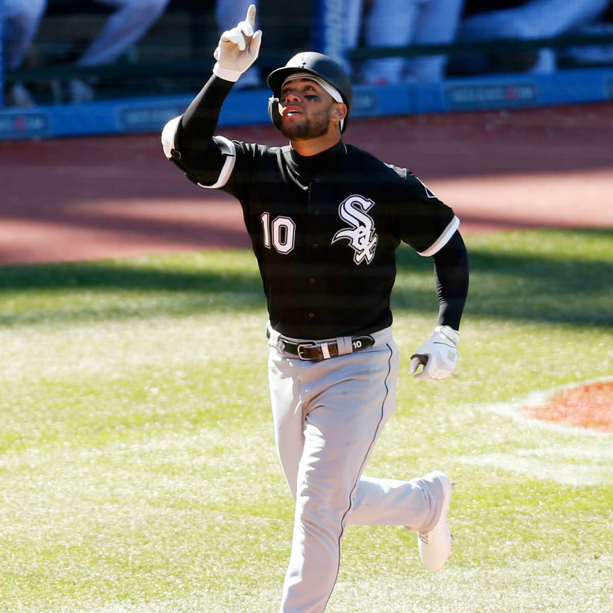 Download Yoan Moncada Running And Pointing Up Wallpaper