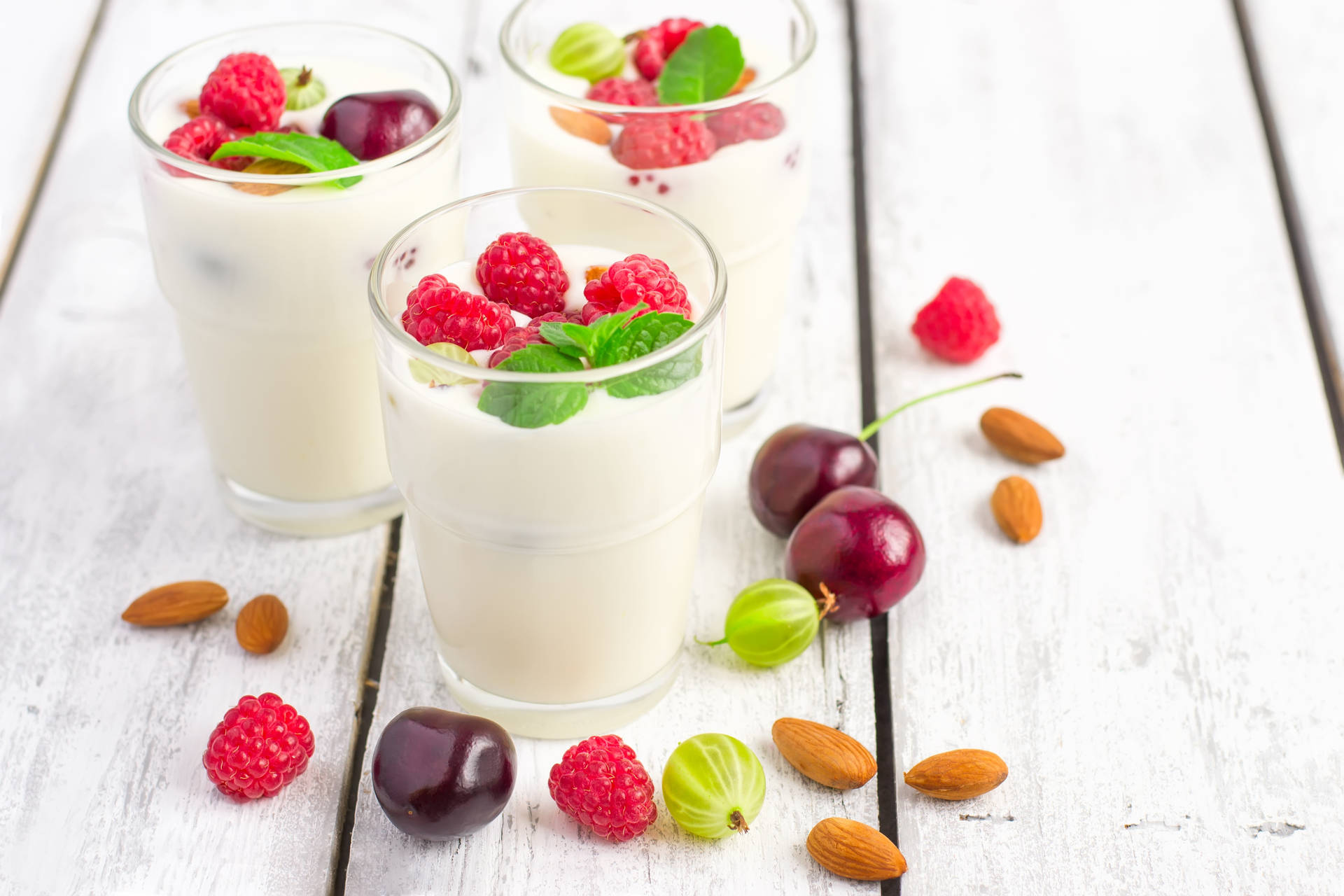 Delightful Mix of Yogurt with Berries and Almonds Wallpaper
