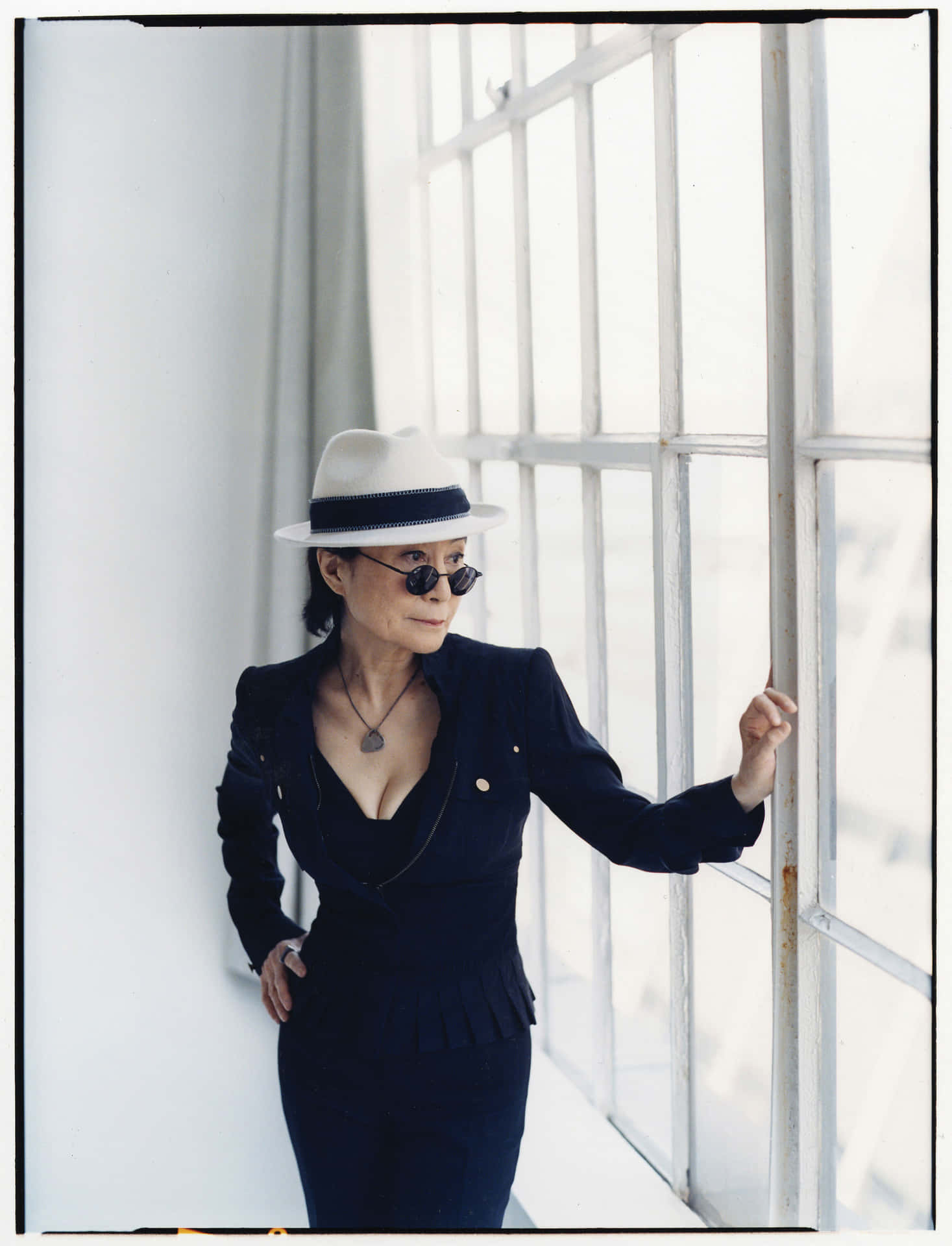 Yoko Ono By Window Wallpaper