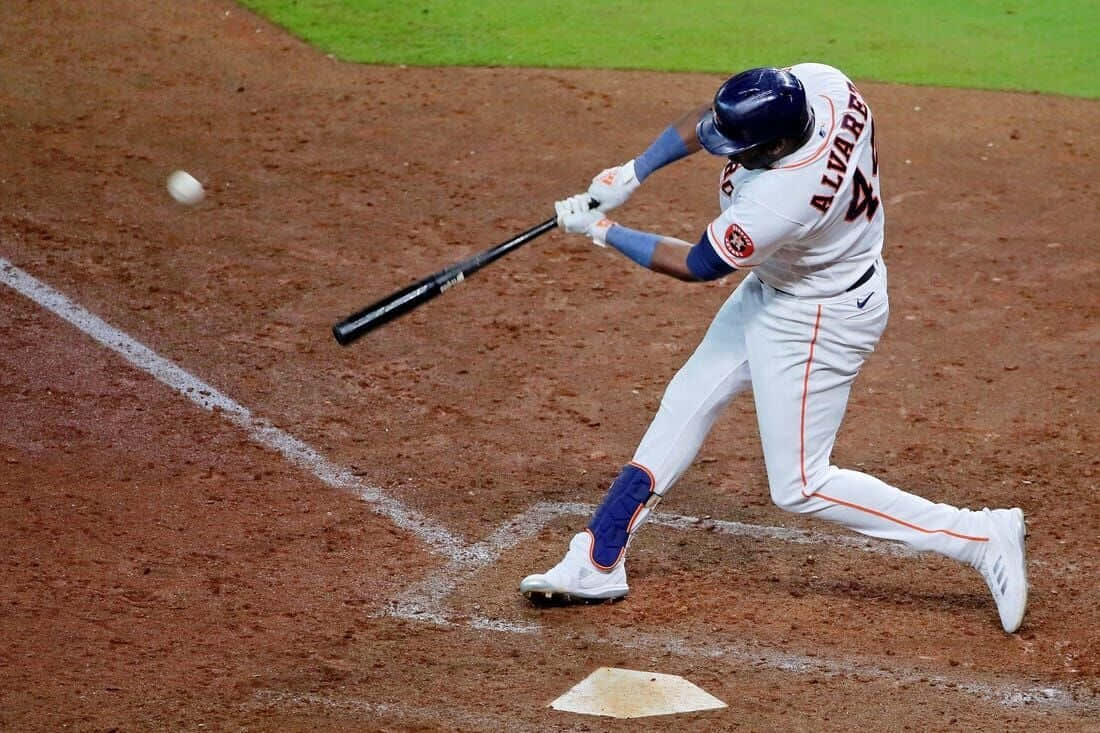 Yordan Alvarez Swinging Baseball Action Wallpaper