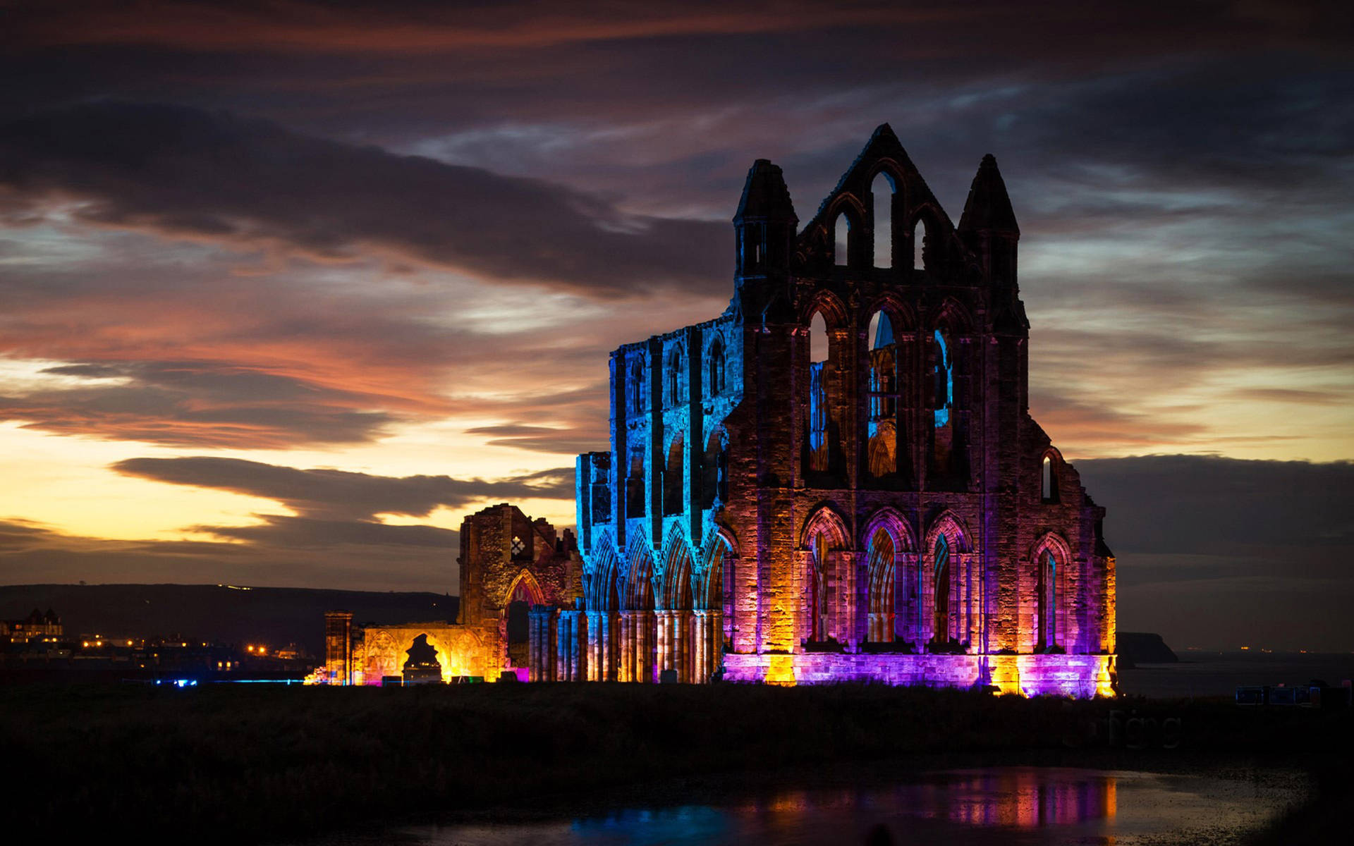Caption: Majestic View of Whitby Abbey in Yorkshire Wallpaper
