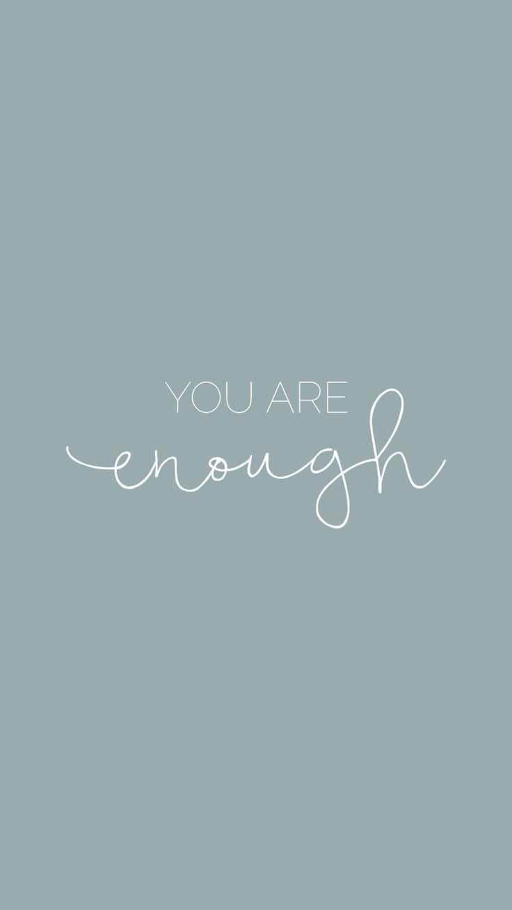 You Are Enough - A White Handwritten Quote On A Blue Background Wallpaper