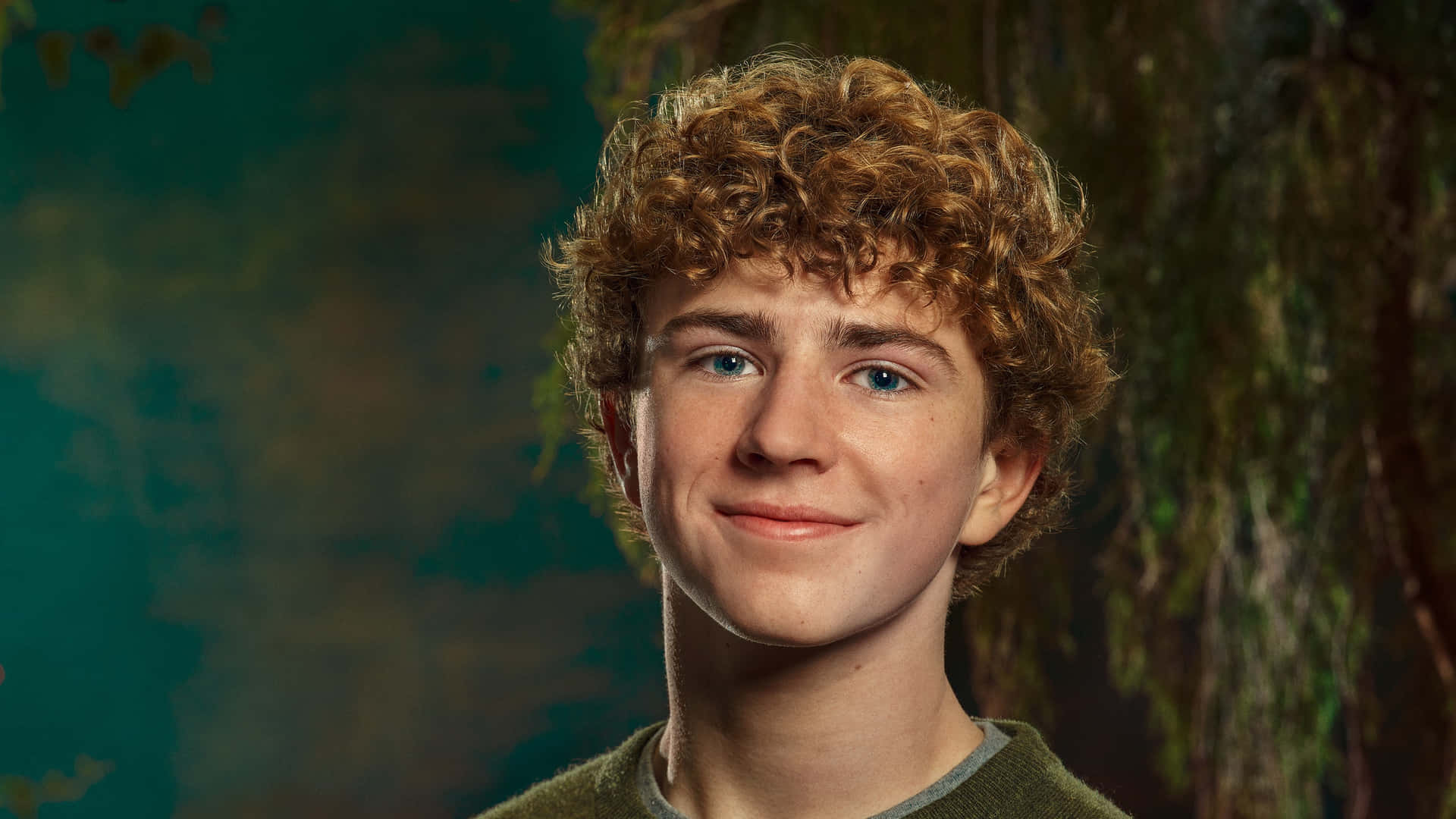 Young Actor With Curly Hair Wallpaper