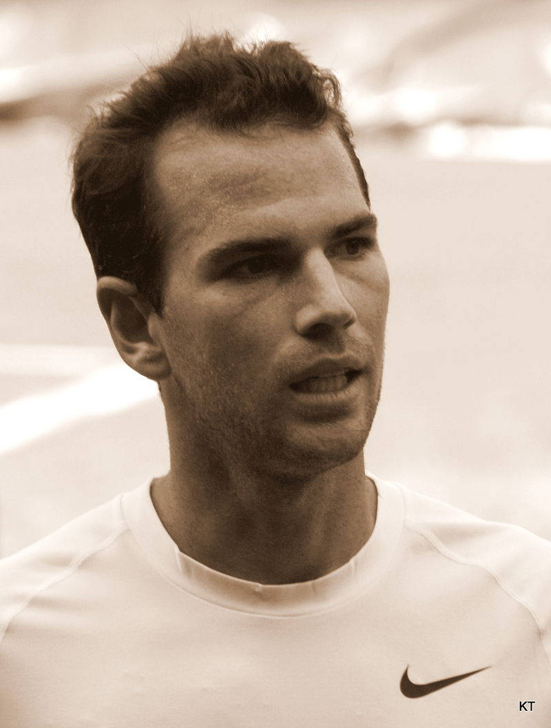 A Man With A Tennis Racket Wallpaper