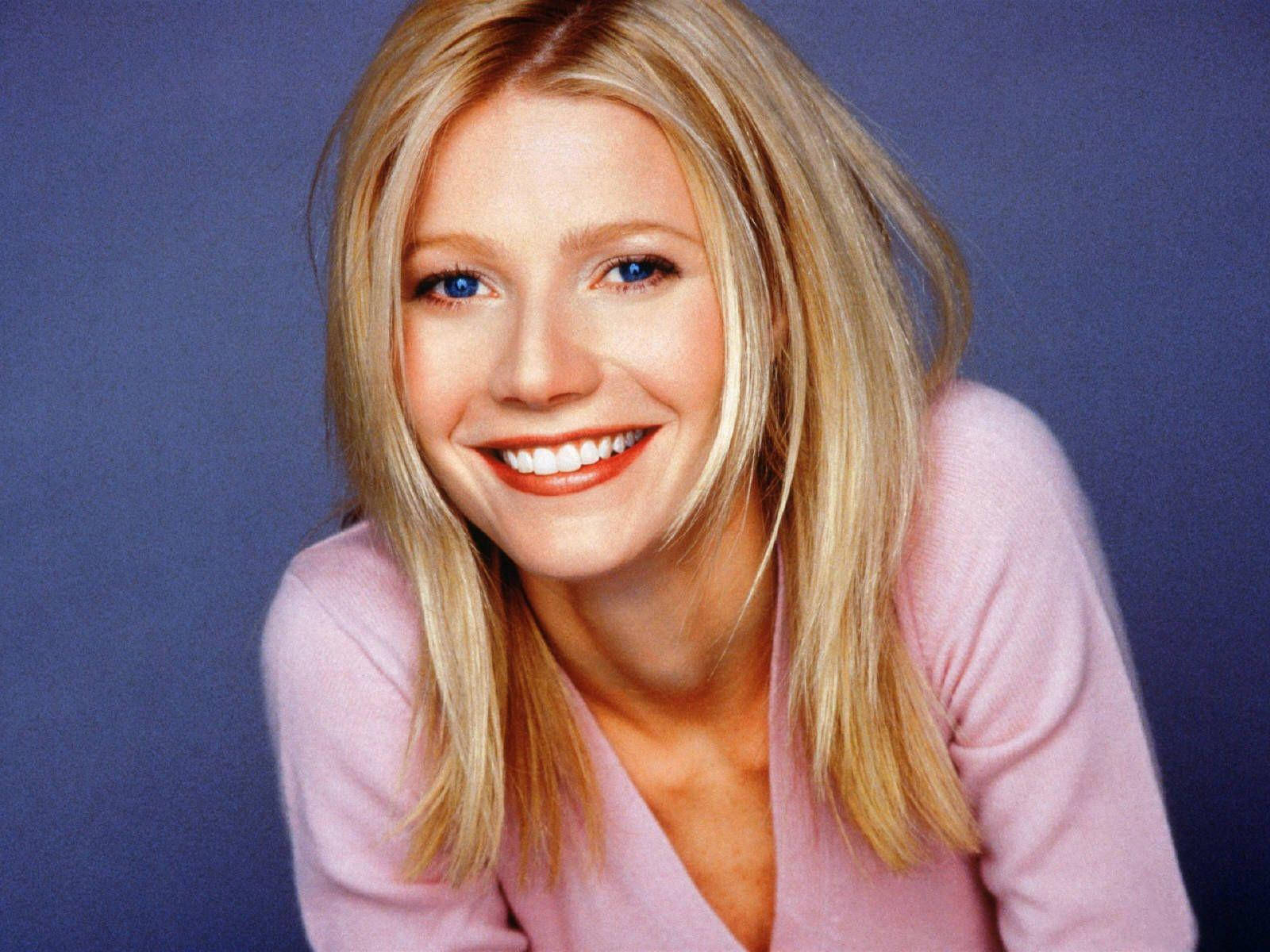 Young American Actress Gwyneth Paltrow Sweet Smile Background