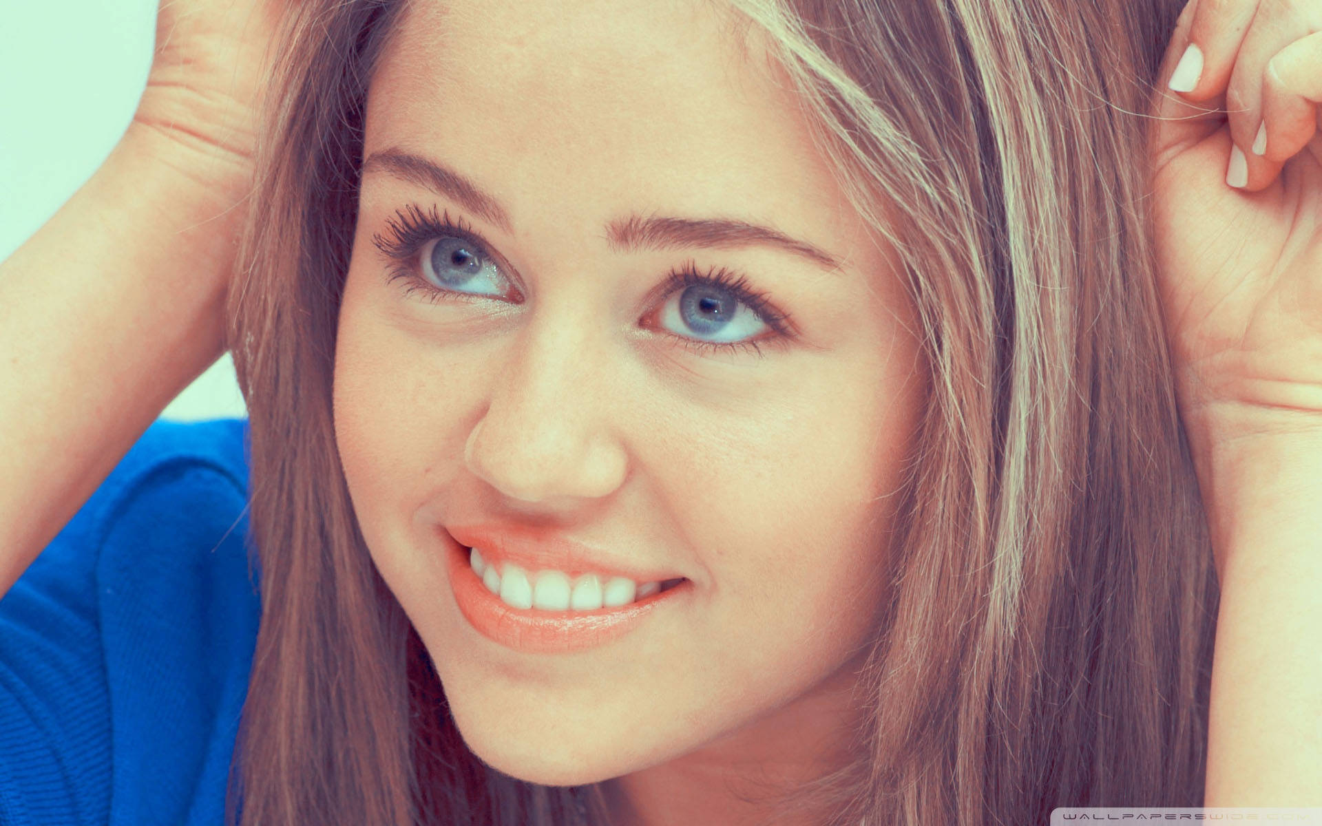 Young And Babyish Miley Cyrus Background