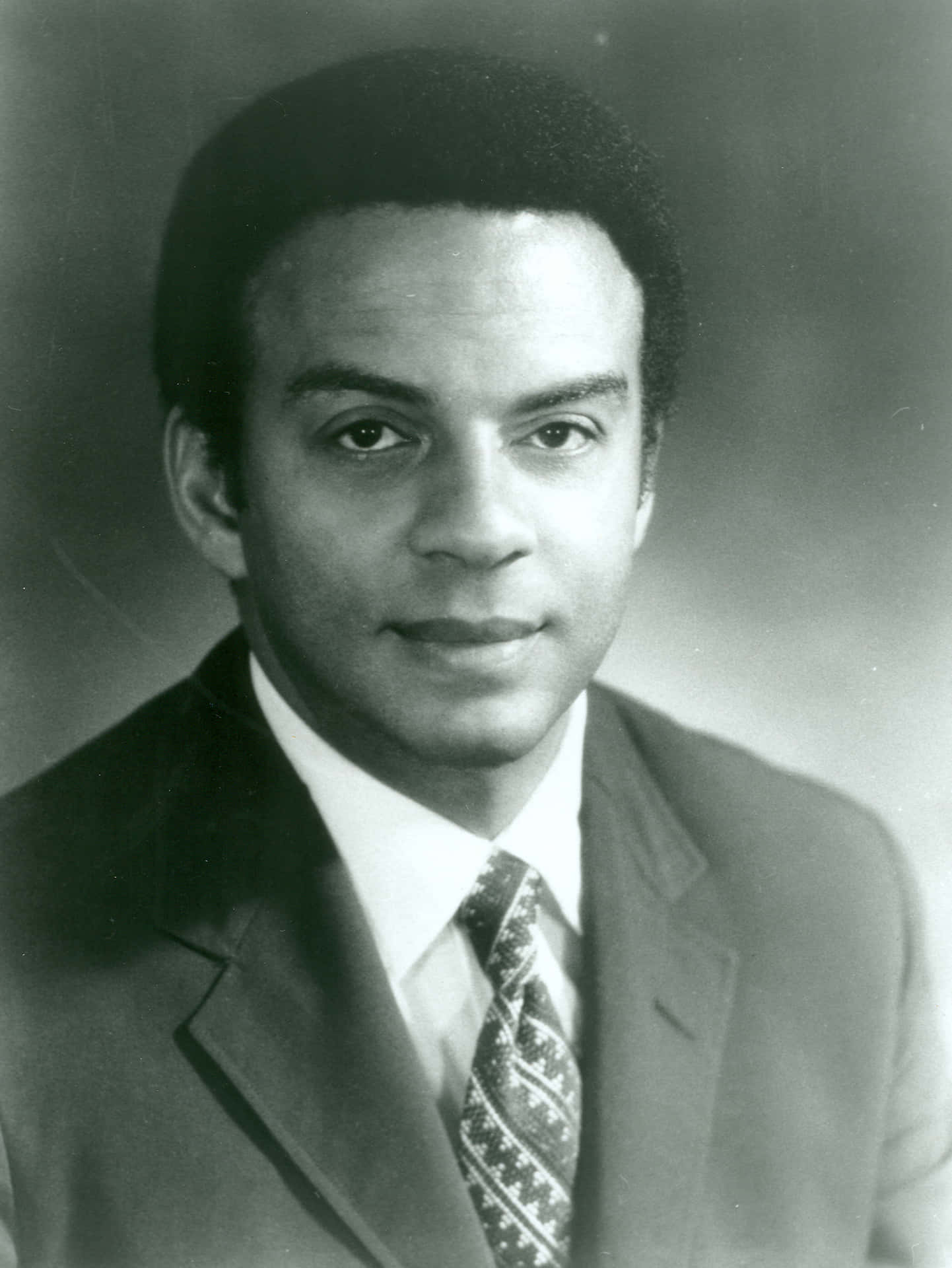 Distinguished Andrew Young in a Business Suit Wallpaper