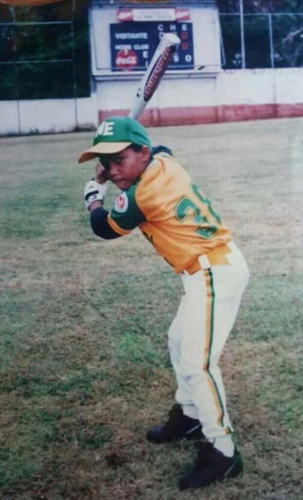 Young Baseball Player Readyto Hit Wallpaper