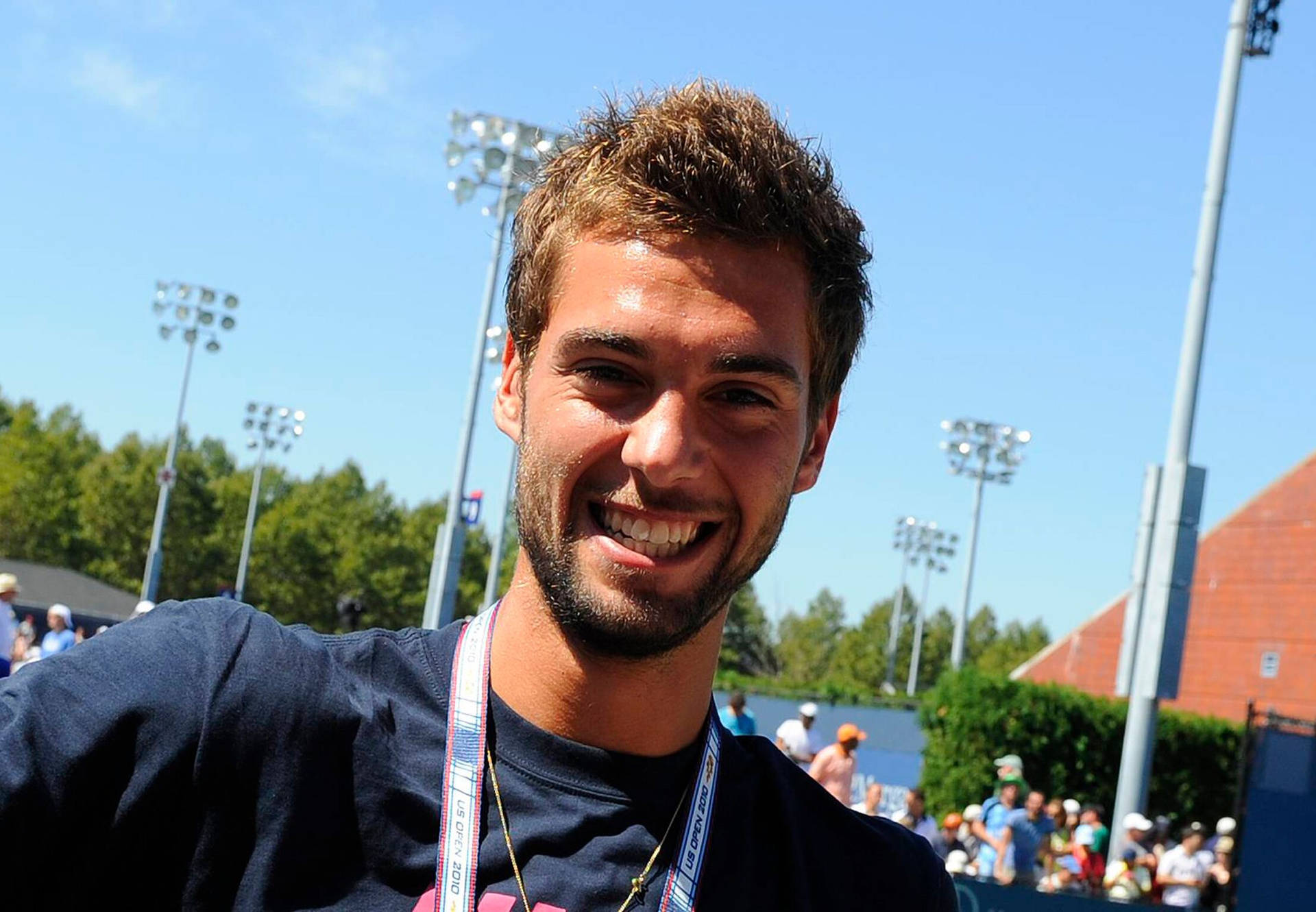 Benoit Paire Smiling Brimming with Confidence Wallpaper