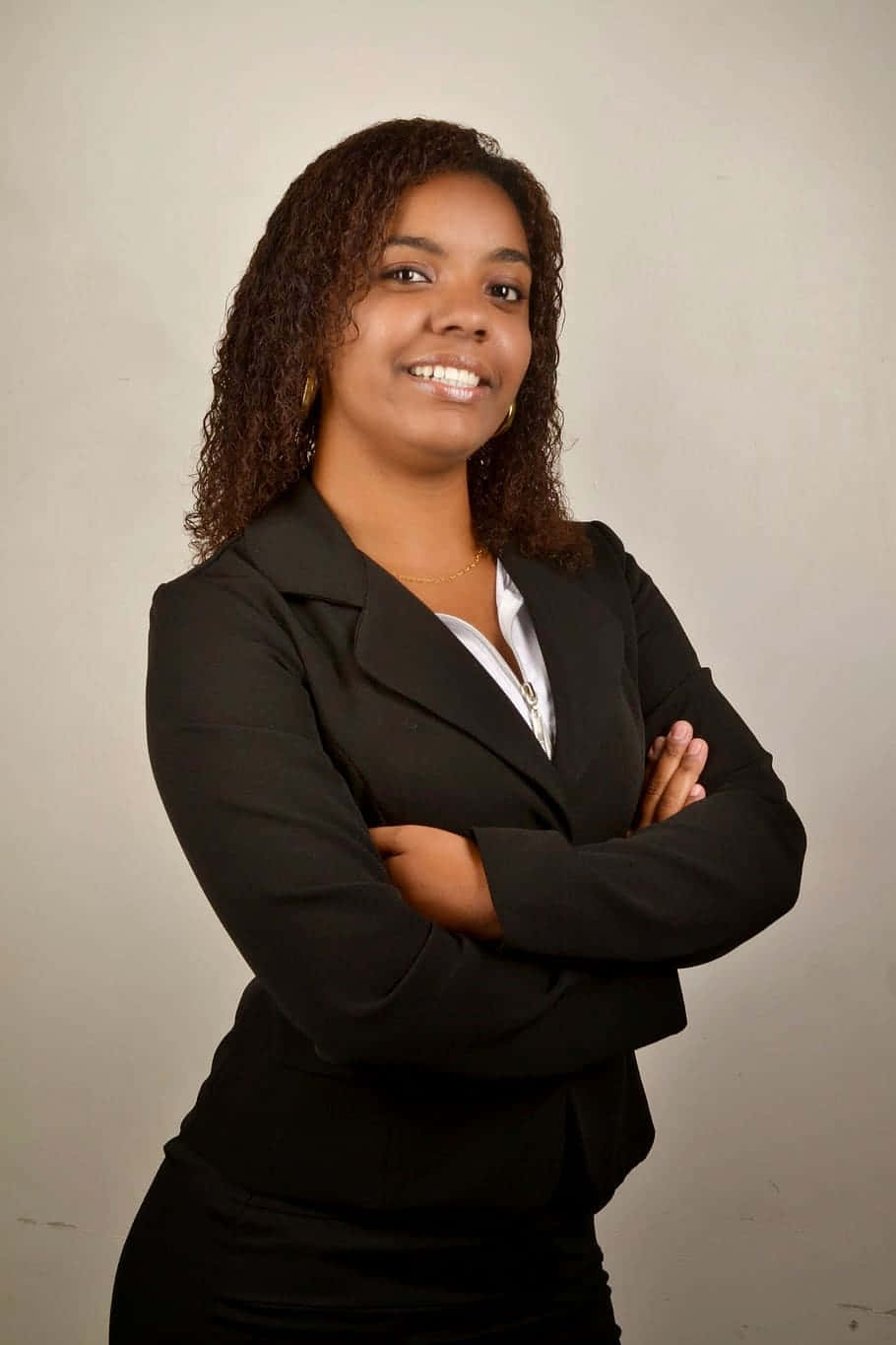 Young Black Woman Smile In Business Suit Wallpaper