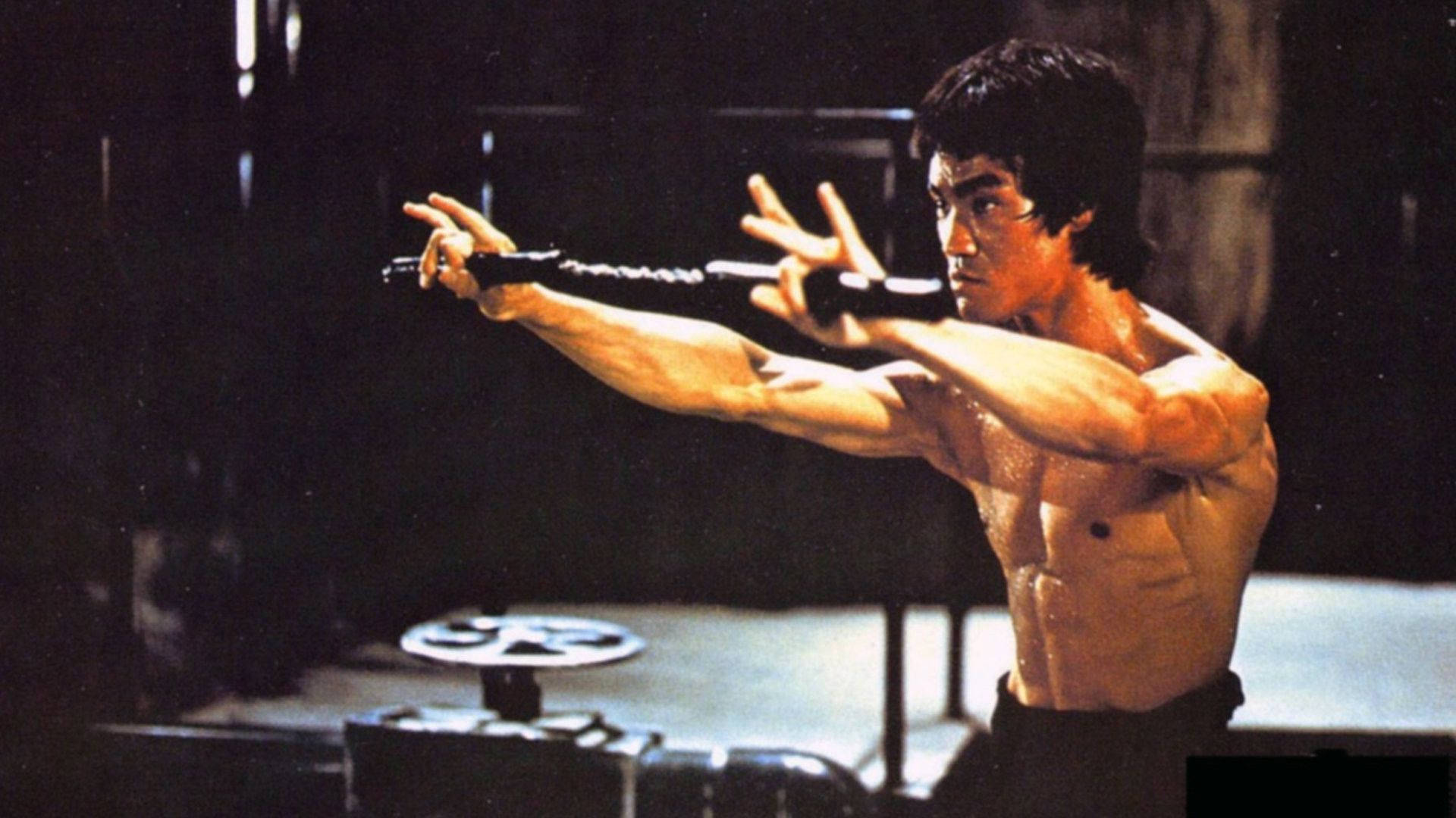 Young Bruce Lee Nunchaku Desktop Picture