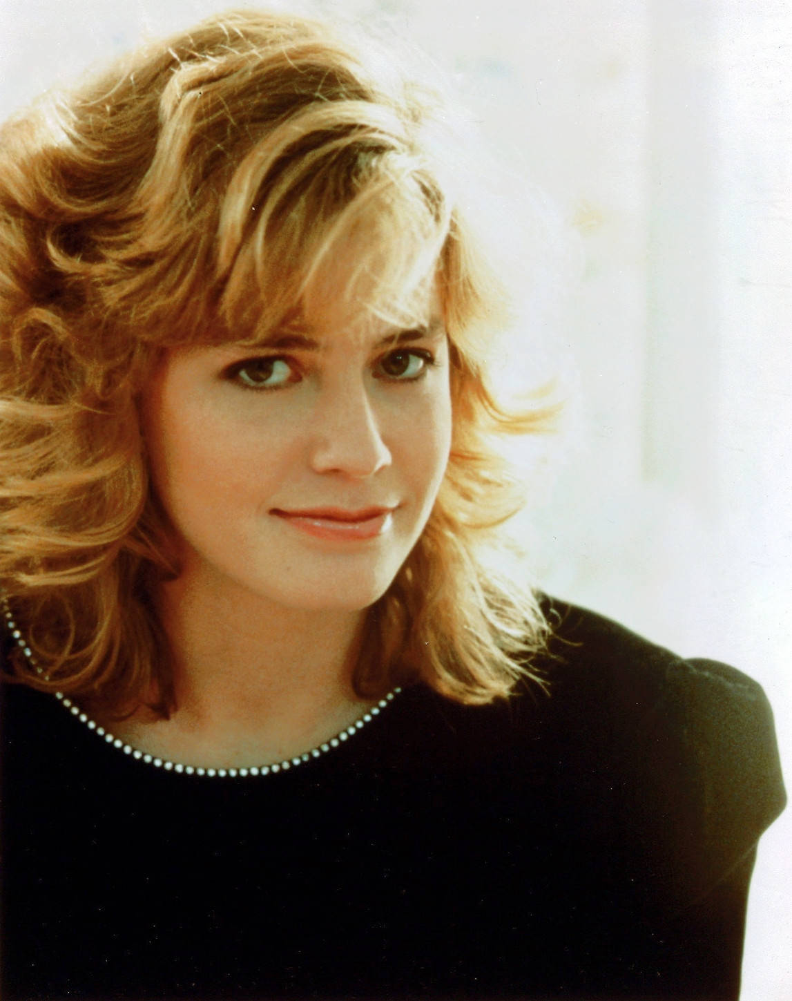 Download Young Elisabeth Shue Wearing Black Puffed Sleeve Top With Side  Bangs Wallpaper 