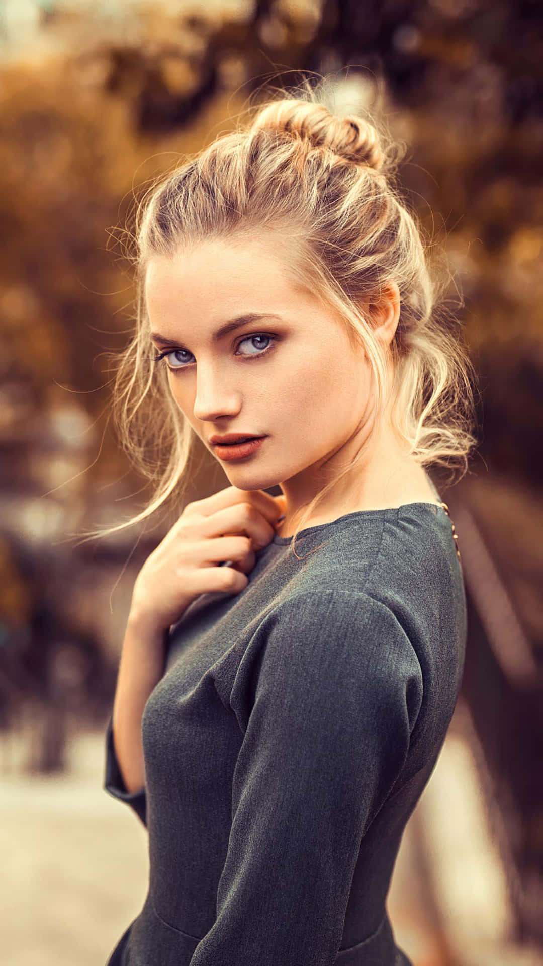 Young Female Model Striking Pose Wallpaper