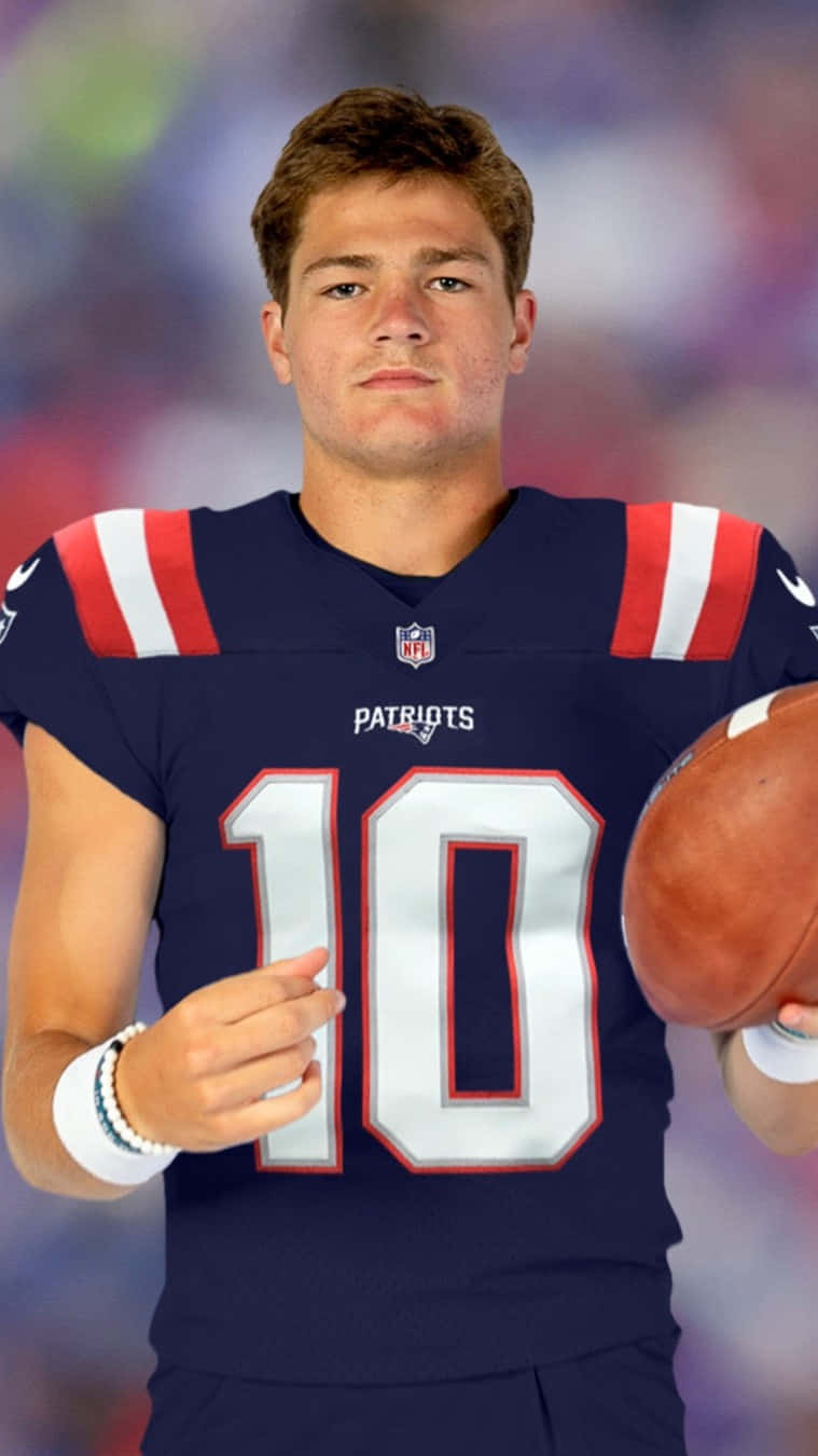 Young Football Player Patriots Number10 Wallpaper