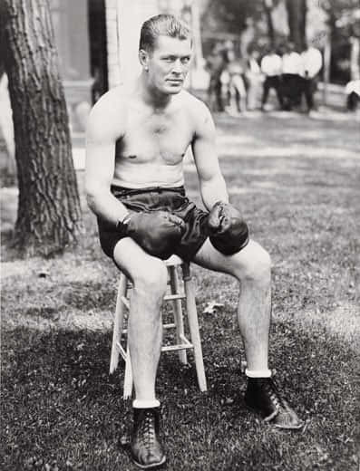 Young Gene Tunney Taking A Break From Training Wallpaper