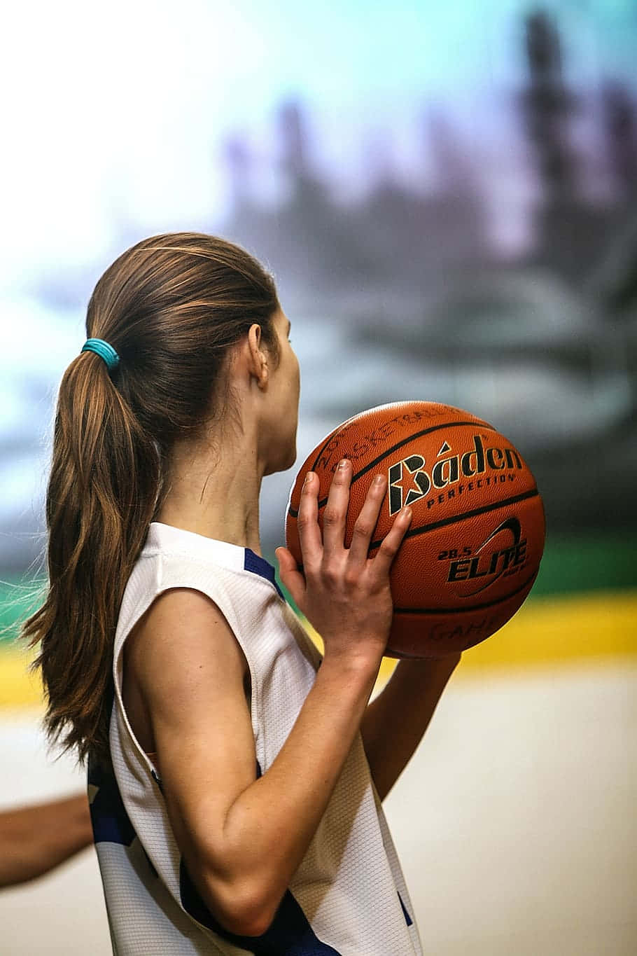 Young Girl Preparing Free Throw Basketball Wallpaper