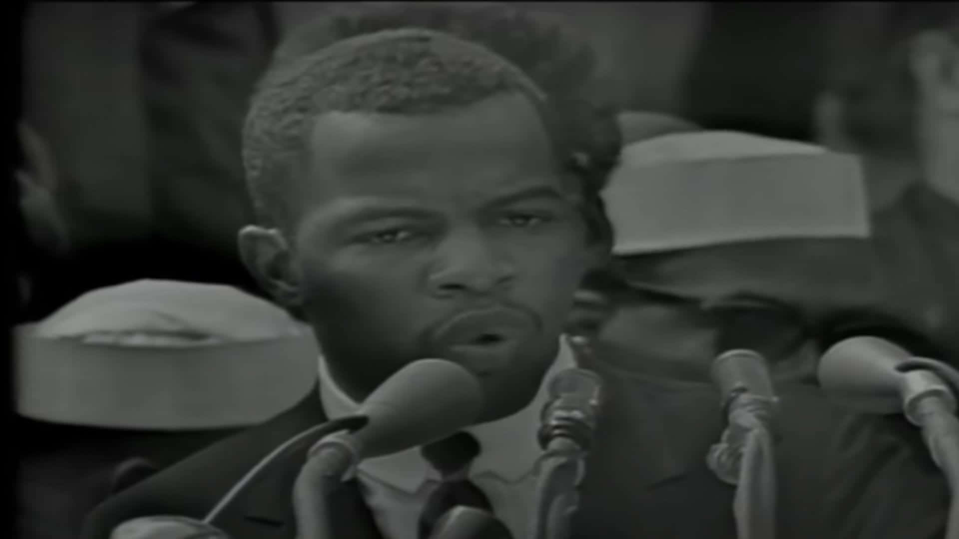 Young John Lewis Delivering A Speech Wallpaper