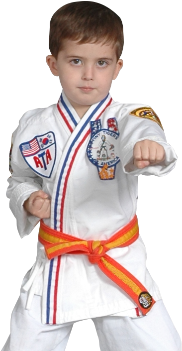 Young Karate Student Orange Belt Pose PNG