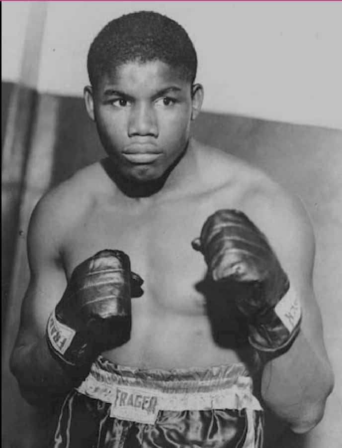 Young Lloyd Marshall With Boxing Gloves Wallpaper