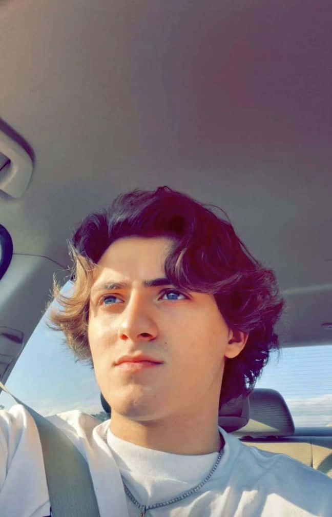 Young Man Car Selfie Sunlight Wallpaper
