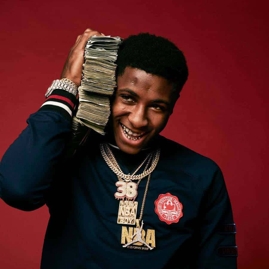 Young Man With Money Stacks Wallpaper