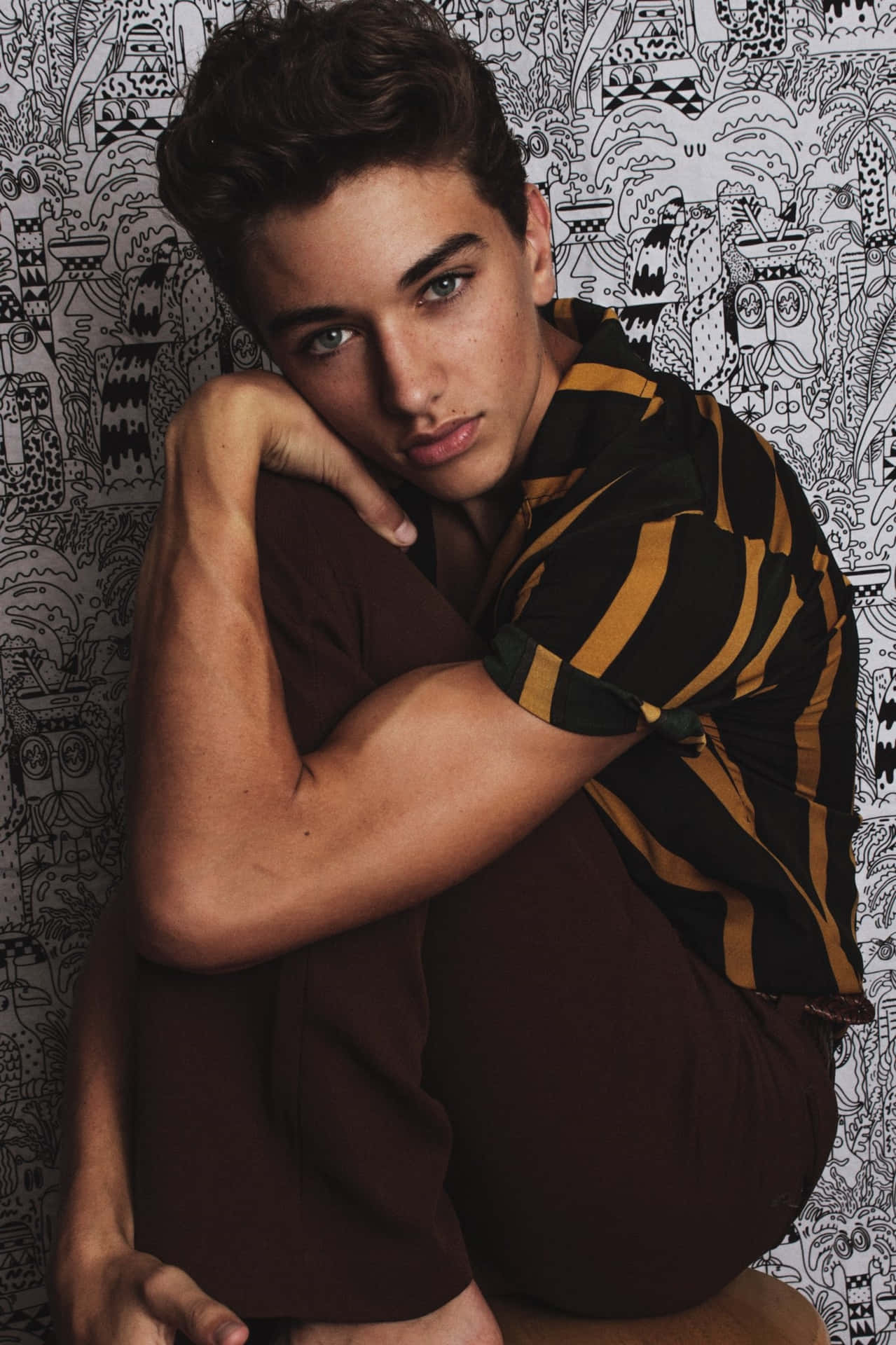 Young Model Pensive Look Striped Shirt Wallpaper