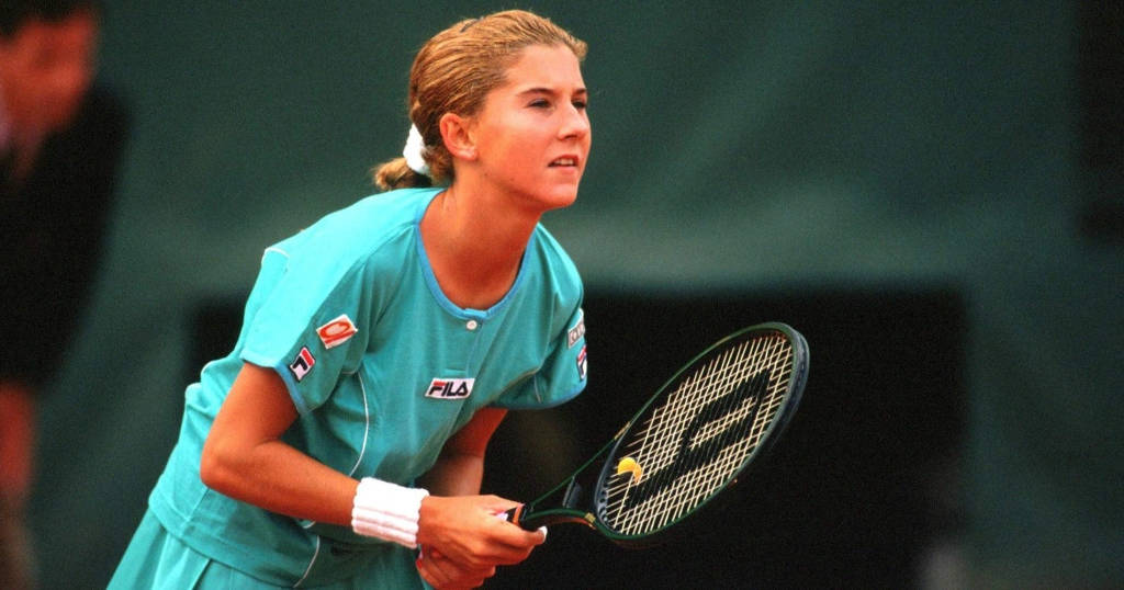 Young Monica Seles During A Game Wallpaper