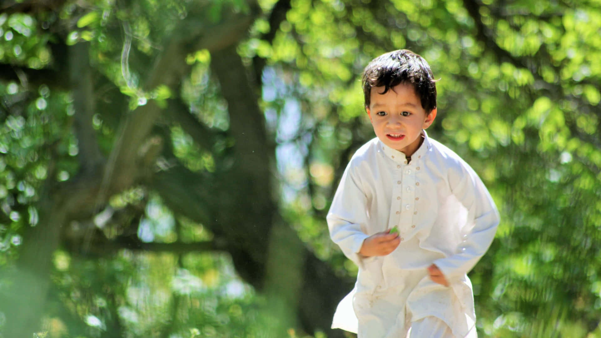 Young Muslim Boy Running Wallpaper
