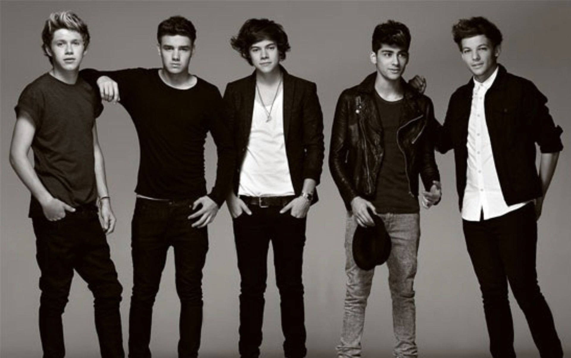 Young One Direction In Black And White Background