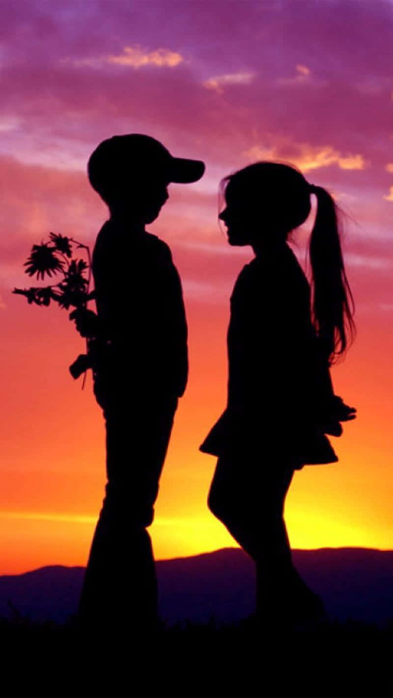 Young Sunset Couple Wallpaper