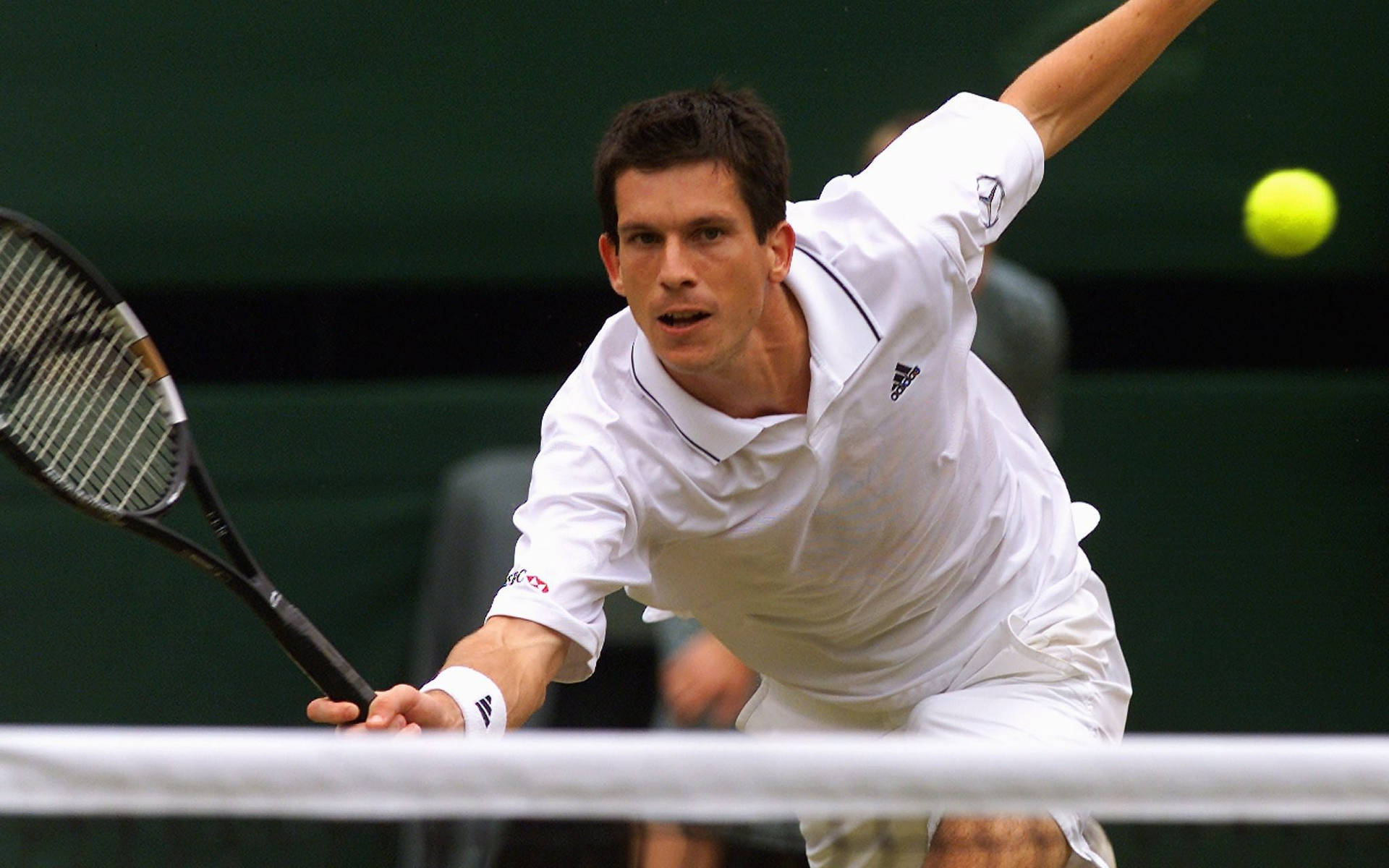 Young Tim Henman Intensively Playing Tennis Wallpaper