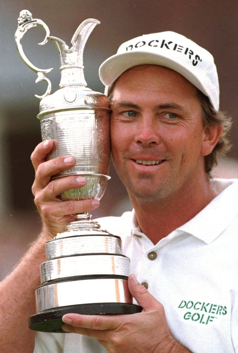 "Young Tom Lehman Celebrating Triumph with Trophy" Wallpaper
