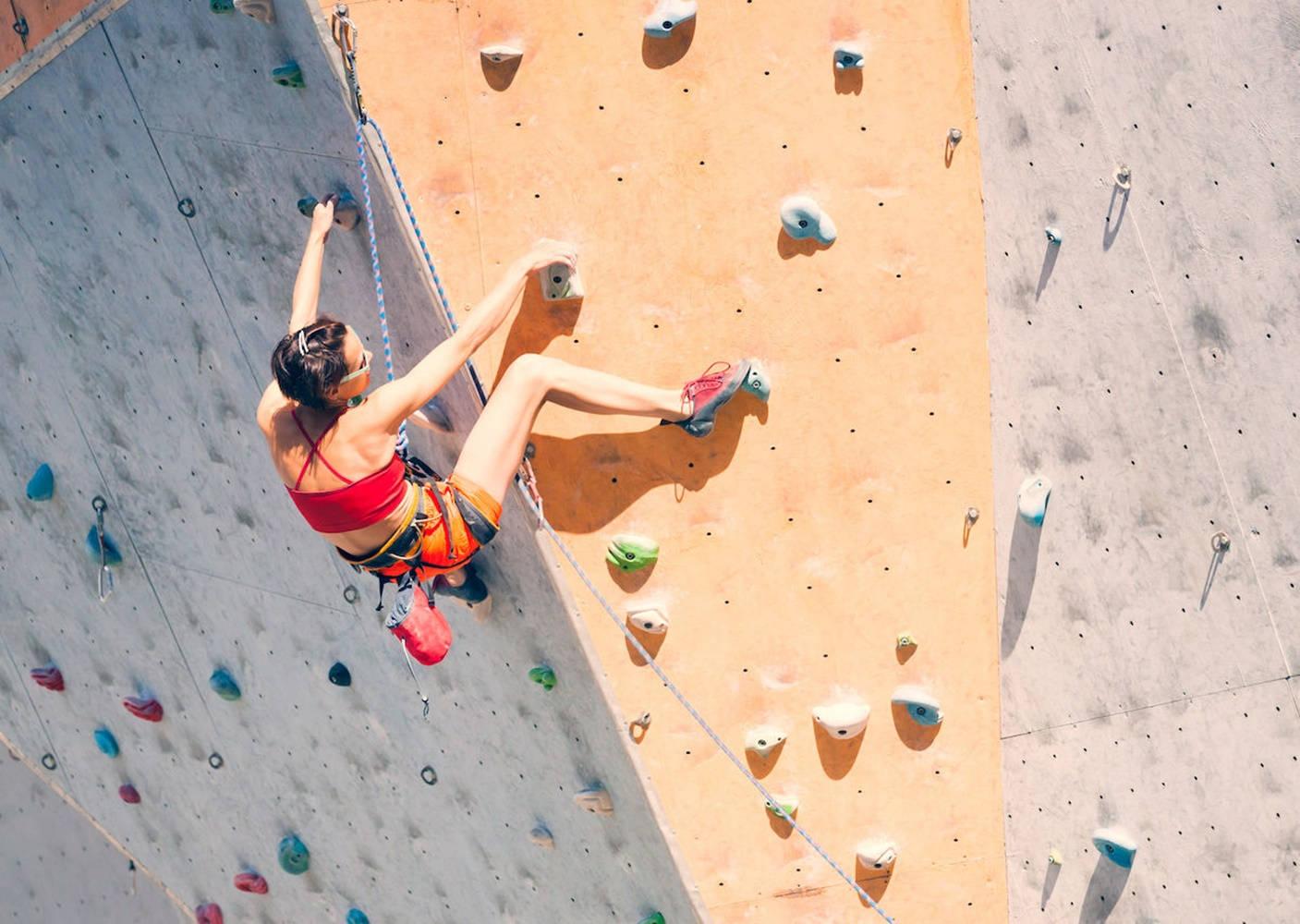 Young Woman Free Sport Climbing Wallpaper