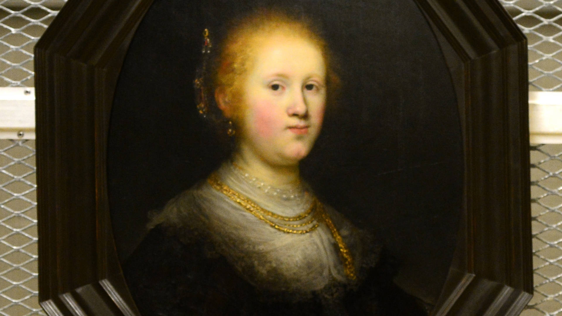 Retratode Una Joven Mujer Al Estilo Rembrandt Fondo de pantalla