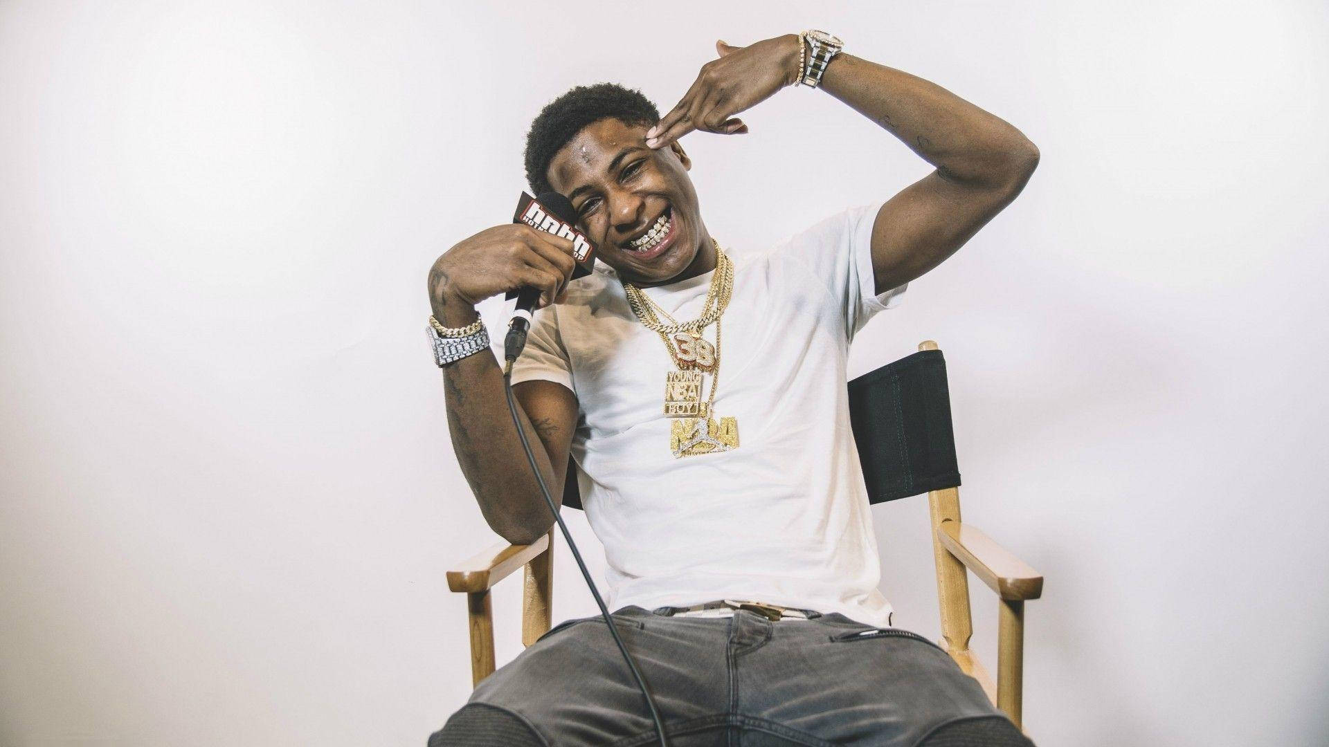 Youngboy Never Broke Again On Directors Chair Wallpaper