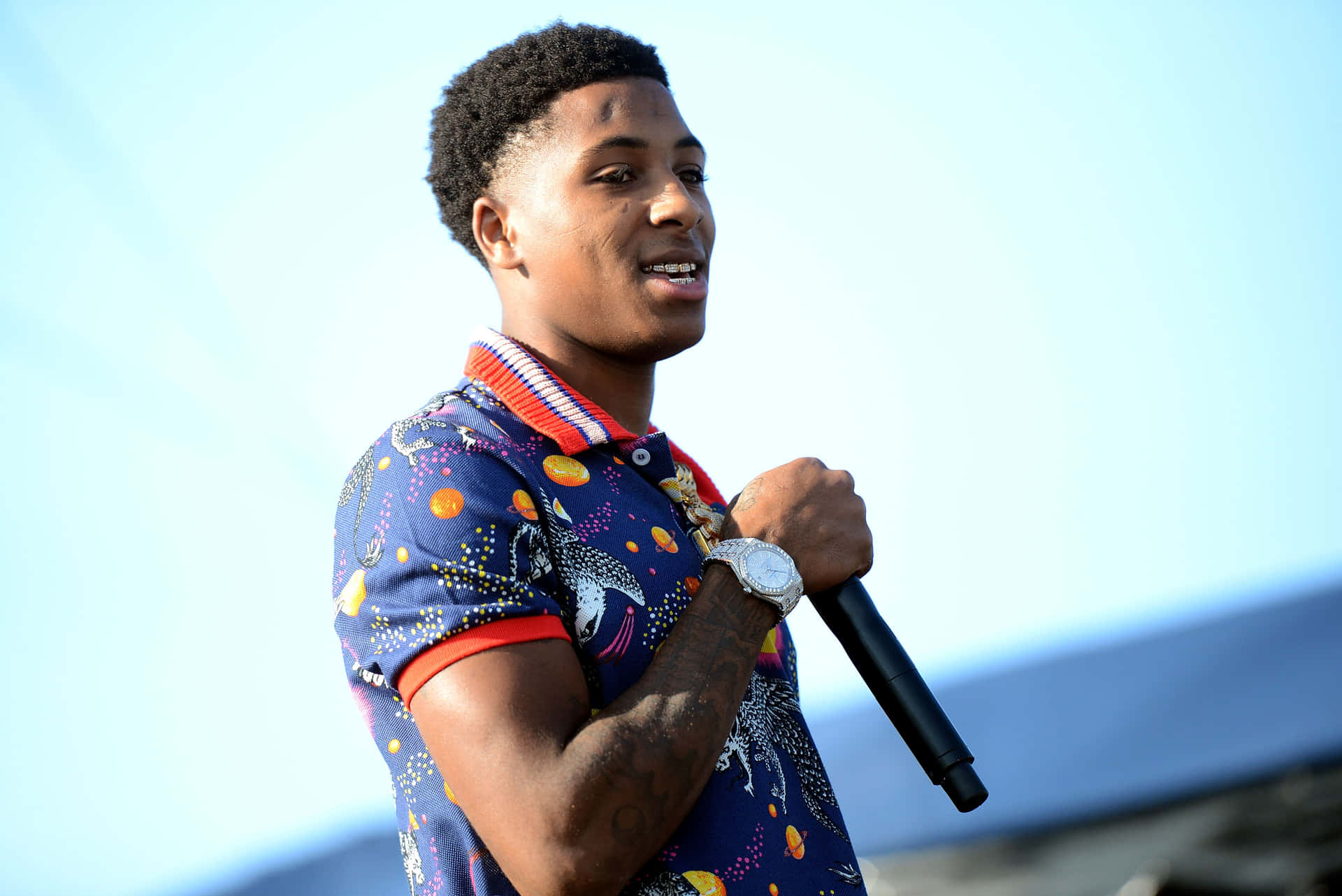 Image  Youngboy stands confidently in the spotlight