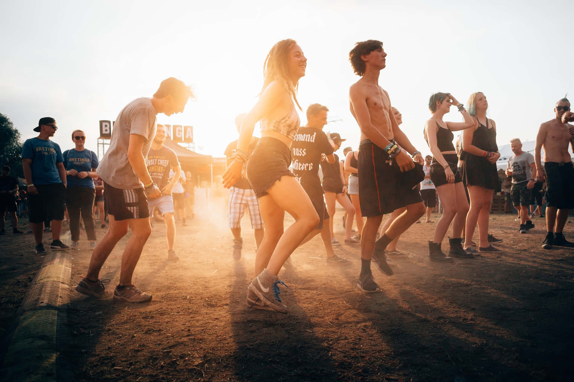 Download Youth Festival Sunlit Dance Wallpaper | Wallpapers.com