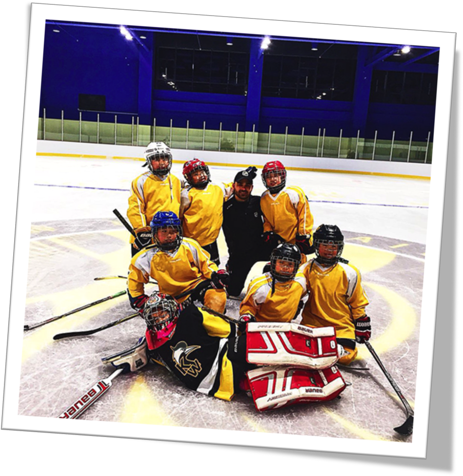 Youth Hockey Teamand Coachon Ice PNG