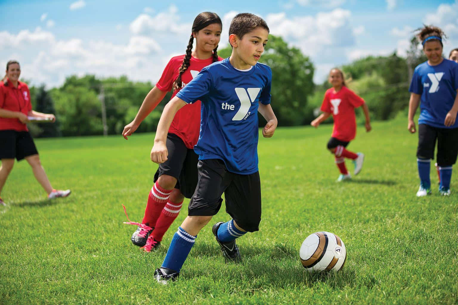 Youth Soccer Game Action.jpg Wallpaper