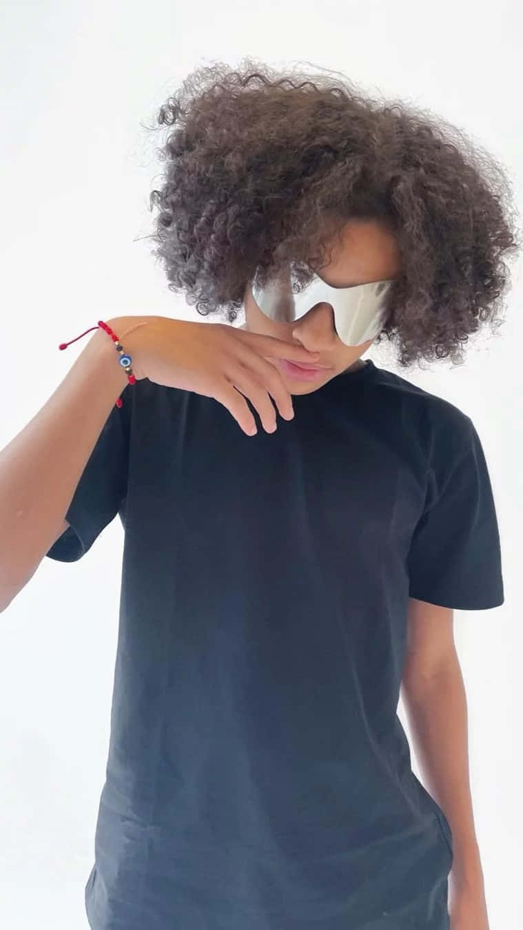 Youth_with_ Sunglasses_and_ Curly_ Hair Wallpaper