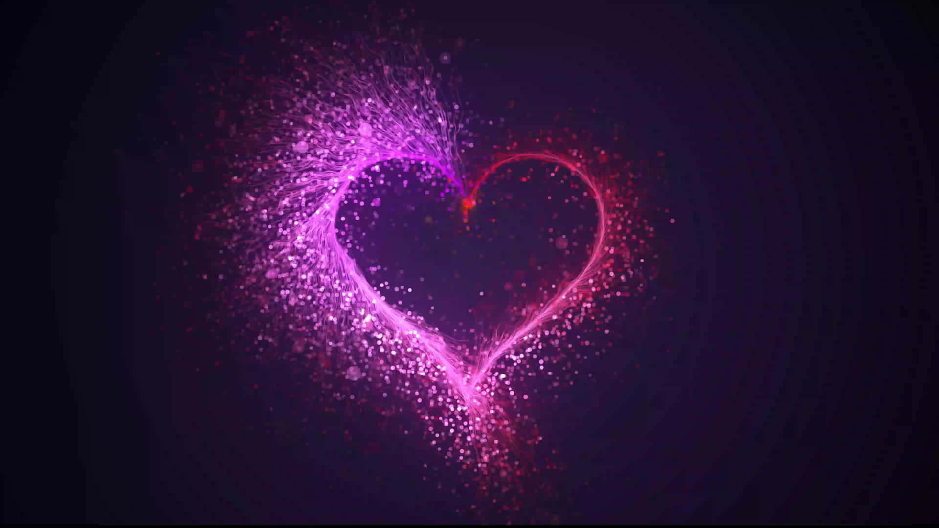 A Heart Shaped Purple And Pink Light