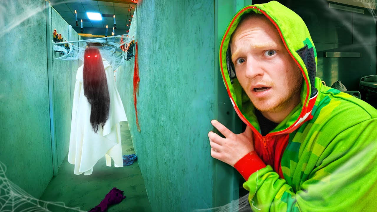 YouTuber Unspeakable i en labyrint af farverige ballon confetti Wallpaper