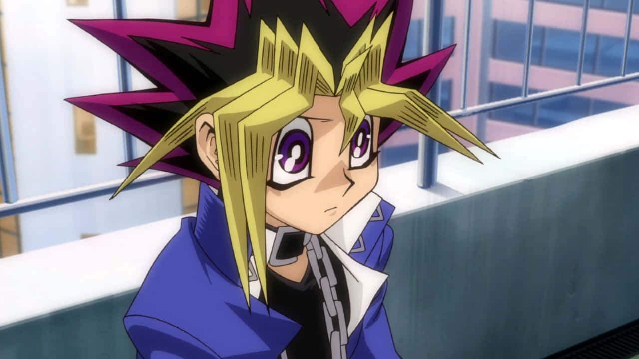 Yugi Muto - The Protagonist of Yu-Gi-Oh! Engaging in an Intense Duel Wallpaper