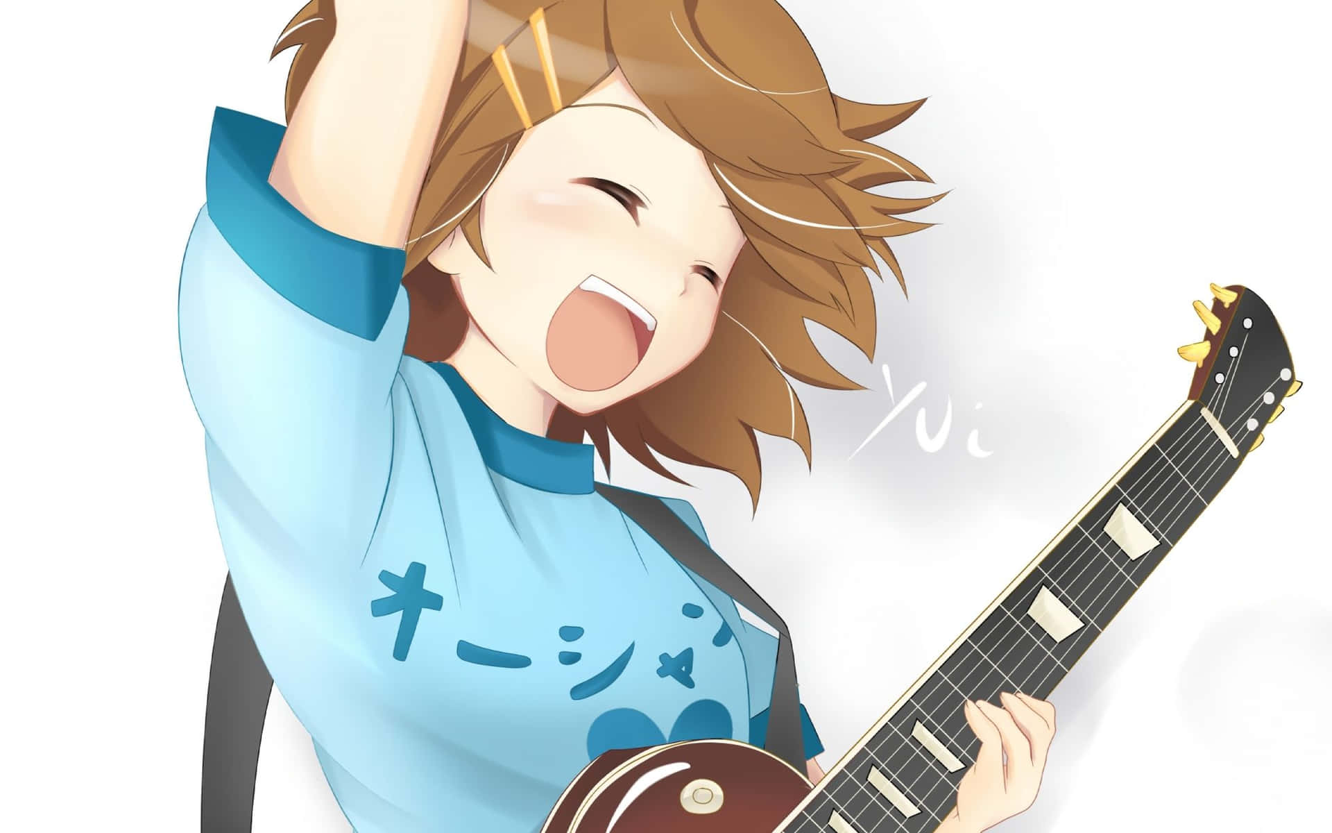 Yui Hirasawa playing her guitar with passion Wallpaper