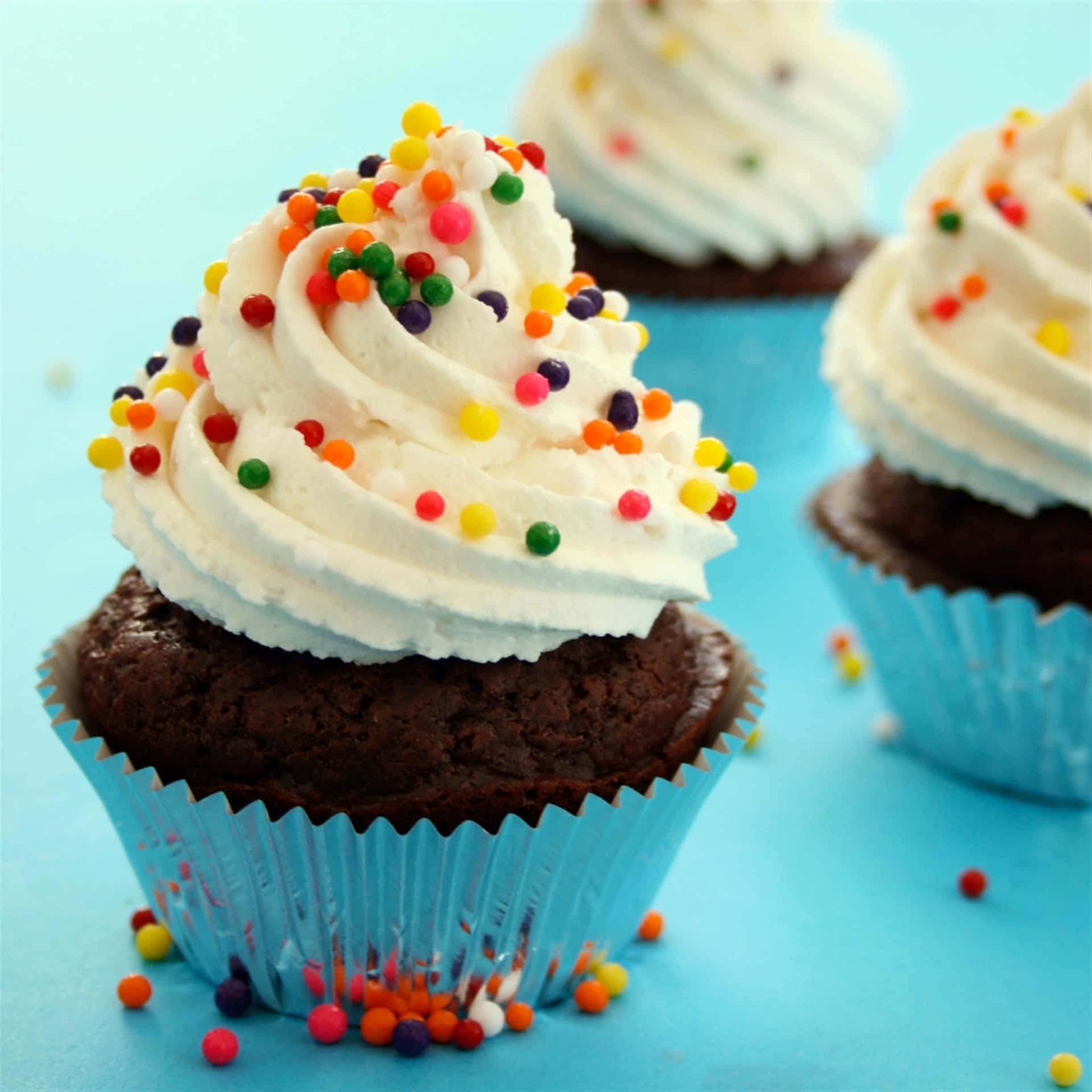 Yummy Cupcake With Cream And Sprinkles Wallpaper