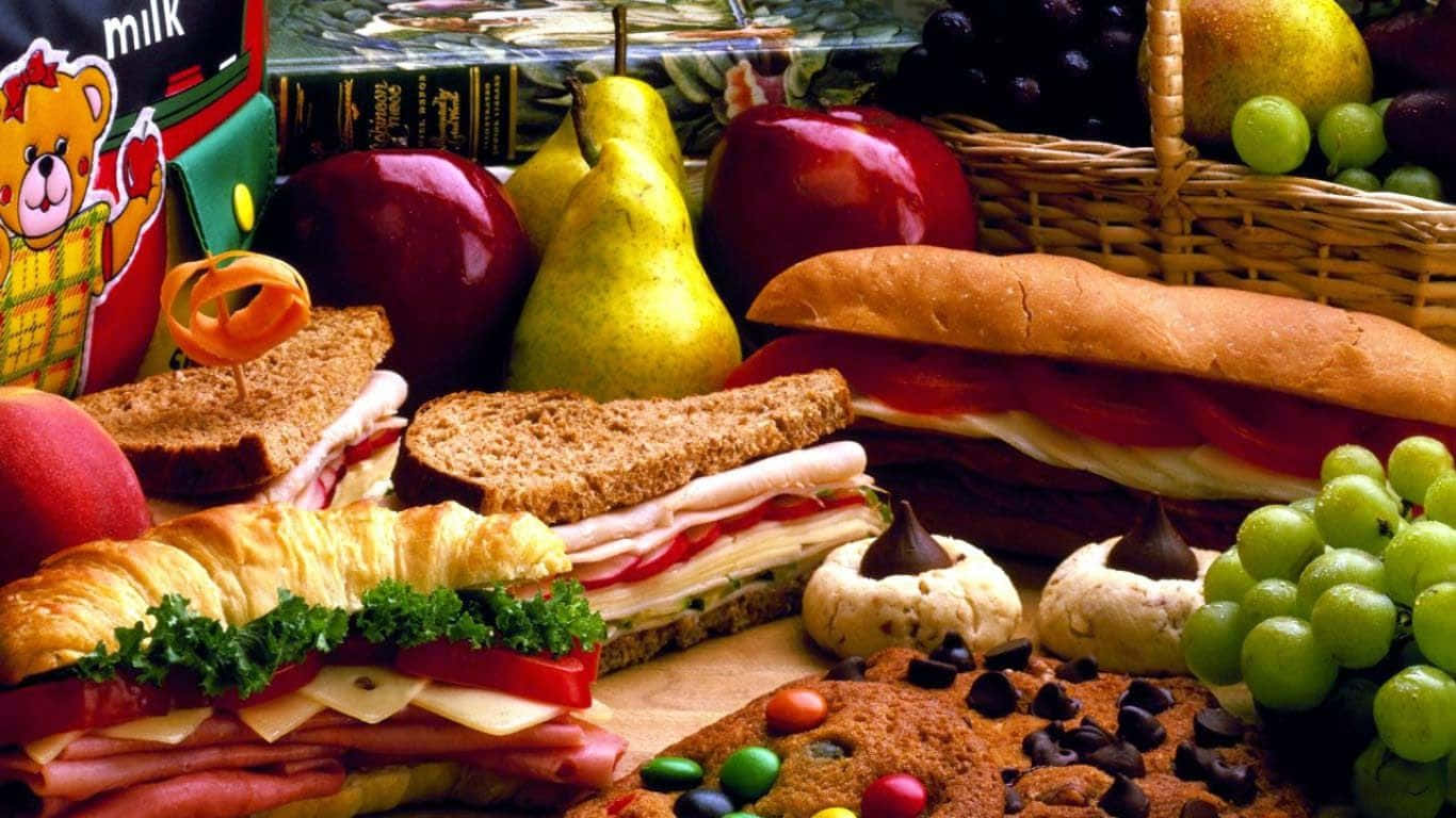 Yummy Sandwiches, Fruits, And Cookies Wallpaper