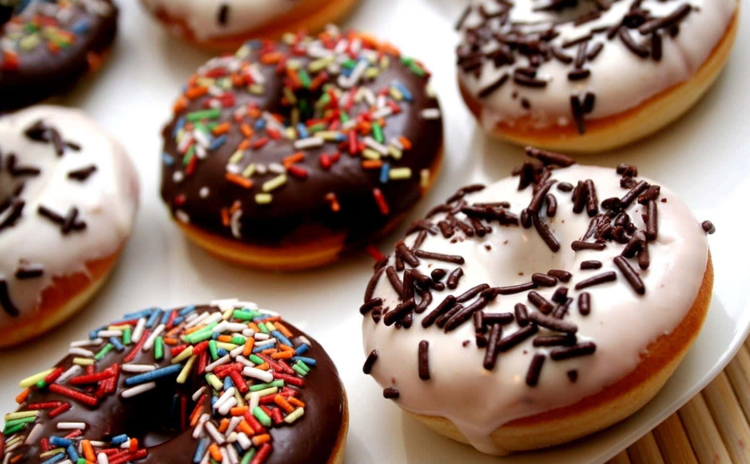 Yummy Sprinkled Donuts Wallpaper